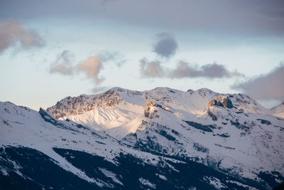 Summits of the swiss alps at dusk in the canton of valais, switzerland.