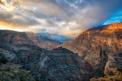 Scenic view of mountains against sky during sunset