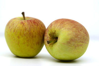 Close-up of apple against white background