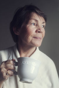 Senior woman drinking coffee