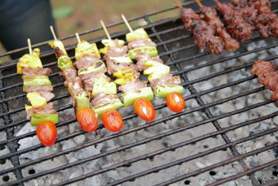 High angle view of food on barbecue grill