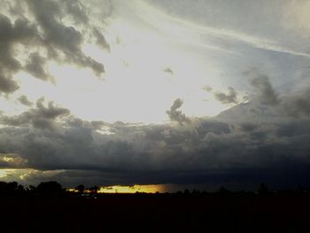 Scenic view of silhouette landscape against sky during sunset