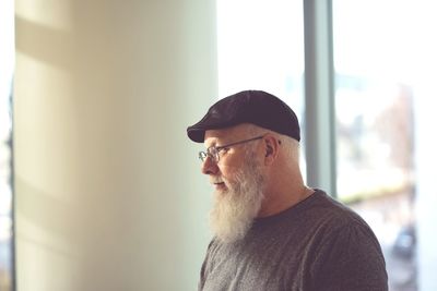 Portrait of man looking at camera