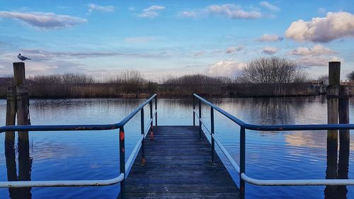 Empty pier against sky