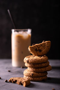 American chocolate cookies and iced latte on a table