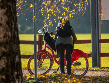 Woman riding bicycle on street