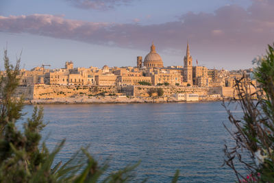 View of cathedral in city against sky