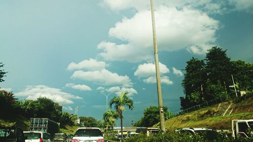 View of road against cloudy sky