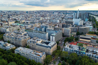 Aerial city landscape of paris, lots of roofs characteristic roofs and chimney