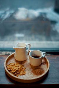 Close-up of coffee and cup on table