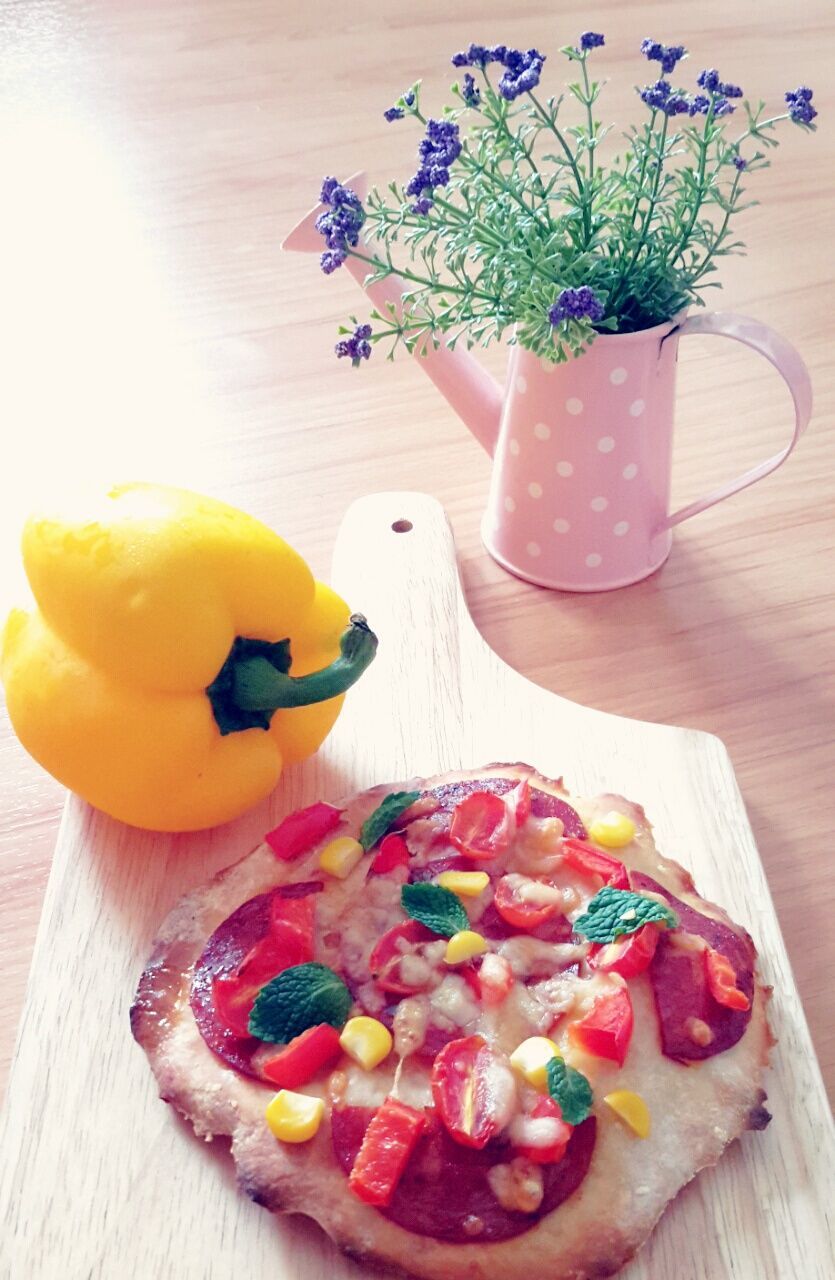 indoors, table, freshness, food and drink, food, still life, fruit, flower, healthy eating, vase, high angle view, decoration, plate, home interior, wood - material, sweet food, no people, ready-to-eat, close-up, multi colored