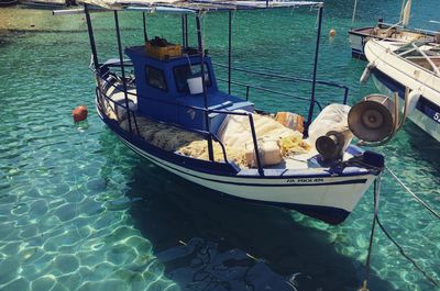 High angle view of boat sailing in sea