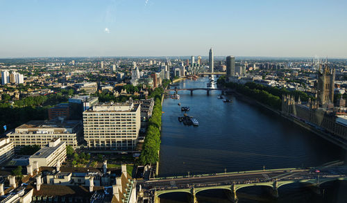 High angle view of bridge over river against buildings