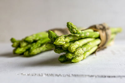 Close-up of green chili pepper on table