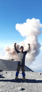 Full length of man standing against sky