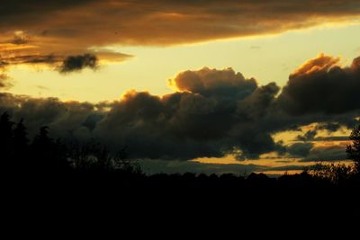 Scenic view of dramatic sky during sunset