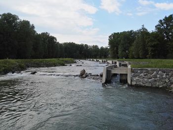 Scenic view of river against sky