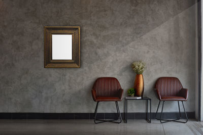 Interior of minimal living room design and wall texture. with a classic picture frame.