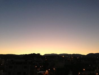 View of illuminated city at night