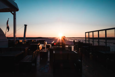 Scenic view of sea against clear sky during sunset