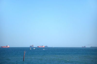 Scenic view of sea against clear sky