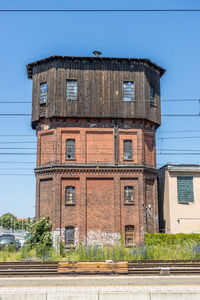 Low angle view of old building against clear sky