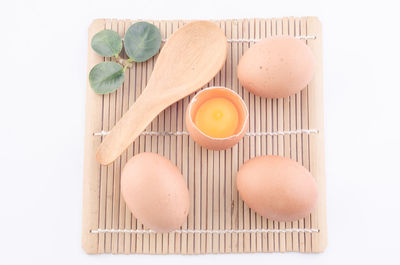 Directly above shot of bread on white background