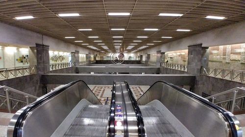 View of escalator in illuminated factory