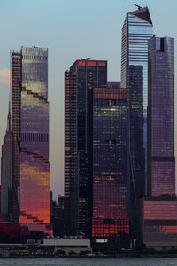 View to manhattan skyline hudson yards skyscrapers, from weehawken waterfront at sunset.