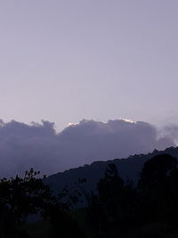 Scenic view of silhouette mountains against sky