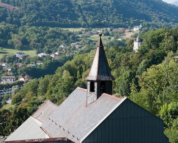 High angle view of trees and buildings against sky