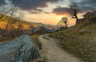 Scenic view of landscape against sky during sunset