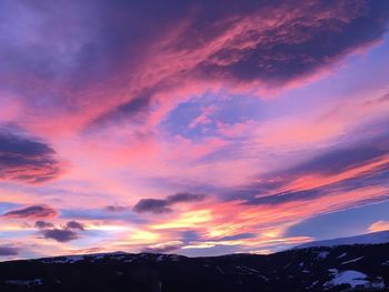 Low angle view of dramatic sky during sunset