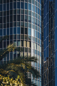 Low angle view of modern glass building