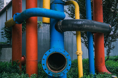 Close-up of pipe hanging on metal pole