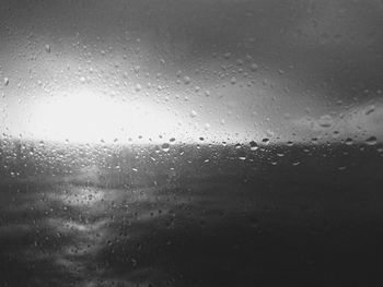 Close-up of water drops on glass