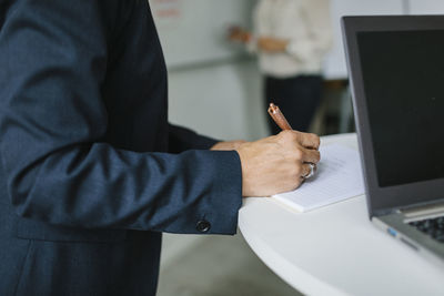 Woman making notes