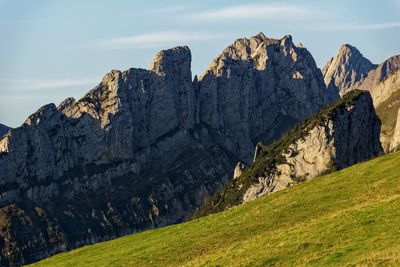 Panoramic view of rocky mountains against sky