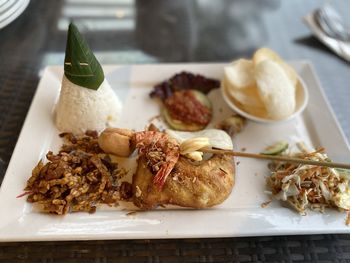 Close-up of food served on table