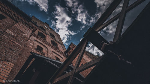 Low angle view of old building against sky