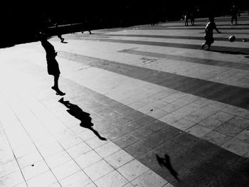 High angle view of people walking on street