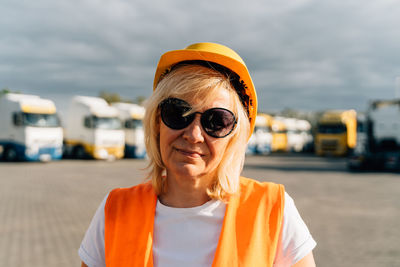 Portrait of young woman wearing sunglasses