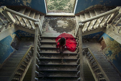 High angle view of woman on staircase