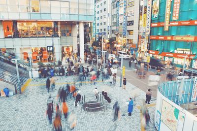 People walking on street in city