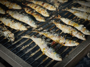 Close-up of meat on barbecue grill