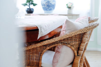 Close-up of empty chairs on table