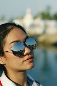 Close-up of woman wearing sunglasses