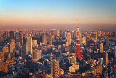 High angle view of city buildings during sunset