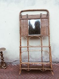 Empty chairs against wall at home