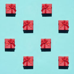 Directly above shot of gifts on blue background